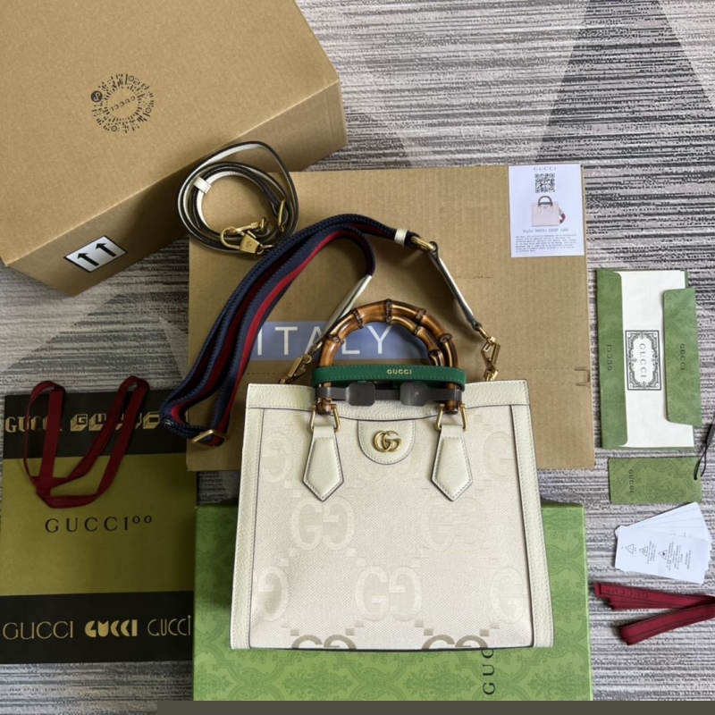 G*u*i top handle bags